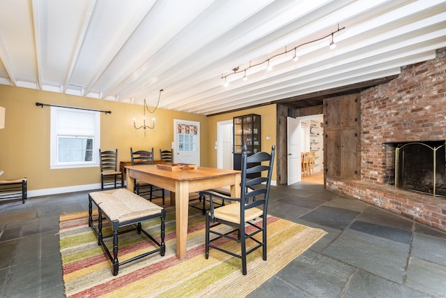 101 Tallmadge Ln, Litchfield, CT 06759 - dining room featuring beam ceiling and a fireplace