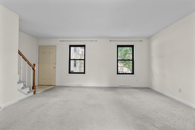 11 Bay Path Way Unit 11, Branford, CT 06405 - carpeted spare room with stairs and baseboards