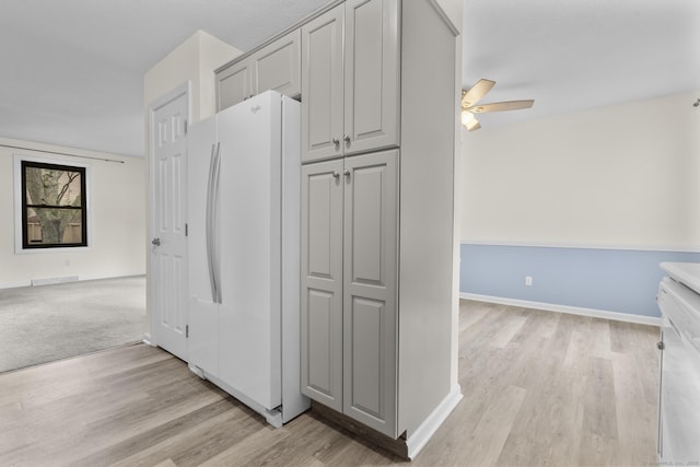 11 Bay Path Way Unit 11, Branford, CT 06405 - kitchen featuring white appliances, open floor plan, light wood finished floors, and ceiling fan