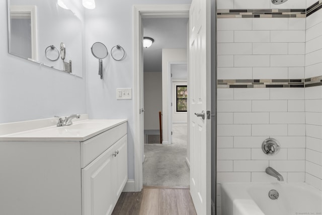 11 Bay Path Way Unit 11, Branford, CT 06405 - bathroom featuring vanity, tub / shower combination, and wood finished floors