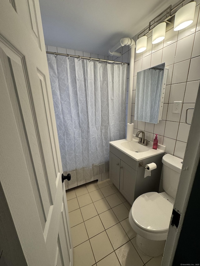 401 Granfield Ave Unit C Bldg 2, Bridgeport, CT 06610 - full bathroom featuring vanity, tile patterned flooring, and curtained shower