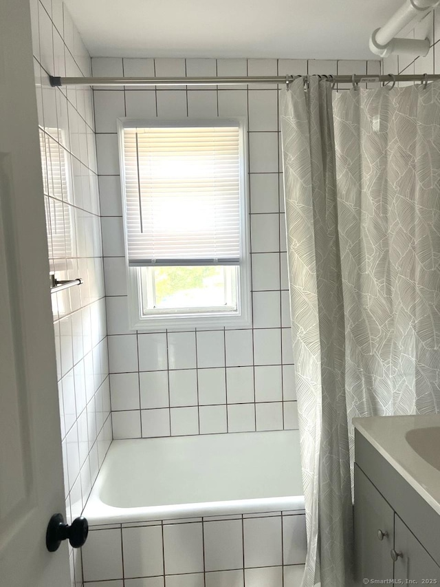 401 Granfield Ave Unit C Bldg 2, Bridgeport, CT 06610 - bathroom with tiled shower / bath and vanity
