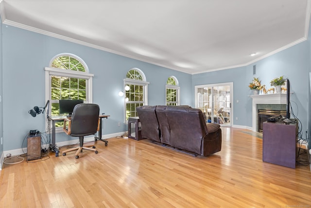 50 Middlebrooks Ave, Trumbull, CT 06611 - living room with light wood-type flooring, a fireplace, crown molding, an office area, and healthy amount of natural light