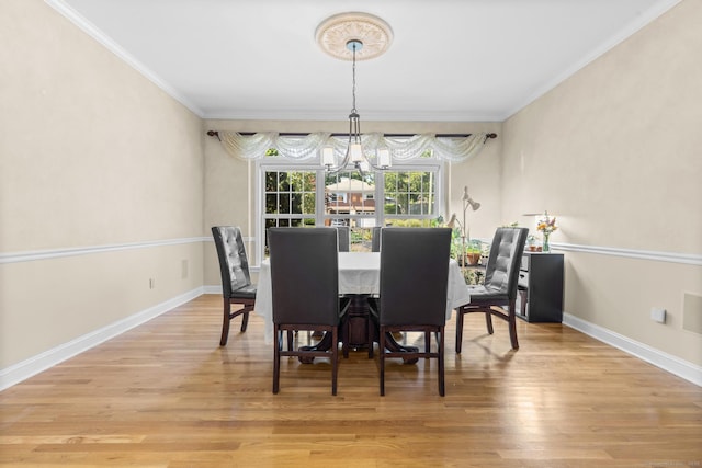 50 Middlebrooks Ave, Trumbull, CT 06611 - dining area featuring a chandelier, crown molding, and light wood-type flooring