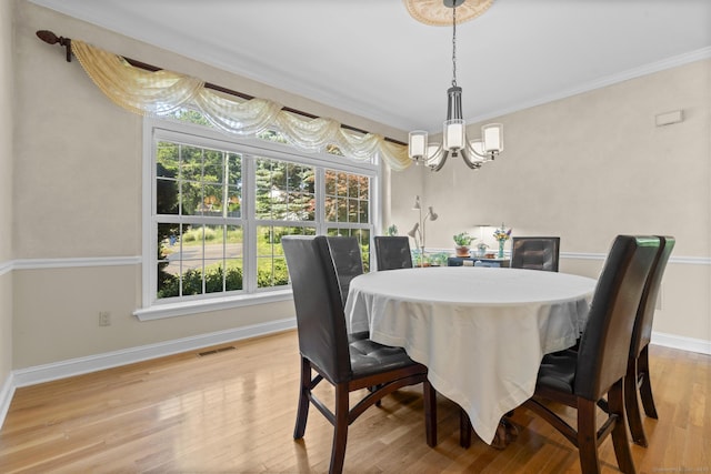 50 Middlebrooks Ave, Trumbull, CT 06611 - dining room with a chandelier, plenty of natural light, light wood-type flooring, and crown molding