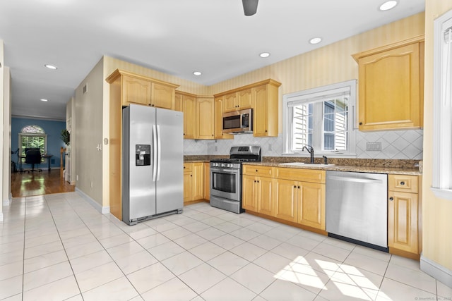 50 Middlebrooks Ave, Trumbull, CT 06611 - kitchen with stainless steel appliances, plenty of natural light, decorative backsplash, and recessed lighting
