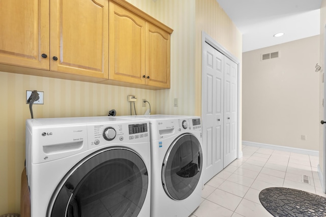 50 Middlebrooks Ave, Trumbull, CT 06611 - laundry area with washing machine and clothes dryer, cabinet space, wallpapered walls, and light tile patterned floors