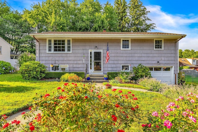 34 Fleming Ct, Groton, CT 06340 - bi-level home featuring an attached garage and a chimney