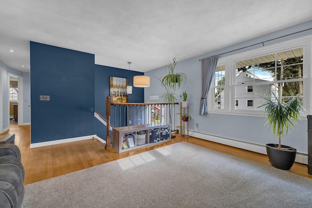 34 Fleming Ct, Groton, CT 06340 - spare room featuring wood finished floors, baseboard heating, and recessed lighting