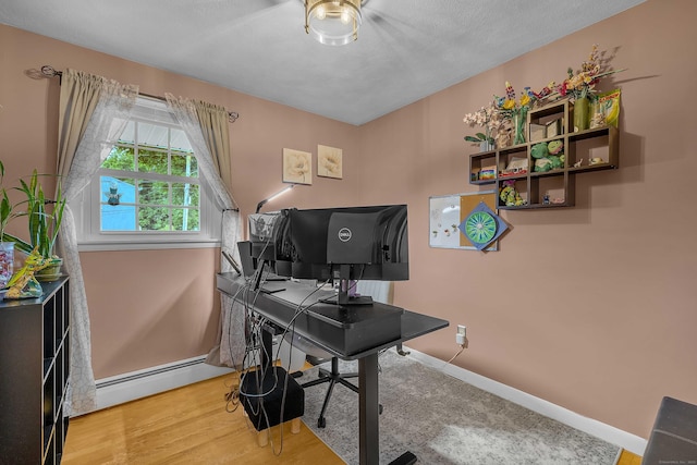 34 Fleming Ct, Groton, CT 06340 - office with a baseboard heating unit and baseboards
