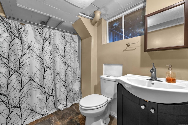 34 Fleming Ct, Groton, CT 06340 - bathroom with vanity, stone finish flooring, and a shower with shower curtain