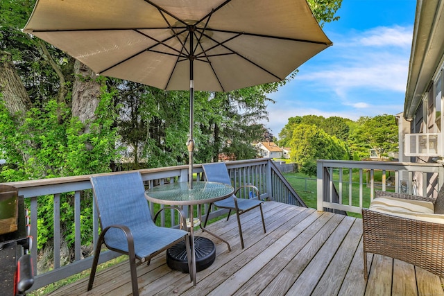 34 Fleming Ct, Groton, CT 06340 - wooden terrace with outdoor dining area and a fenced backyard