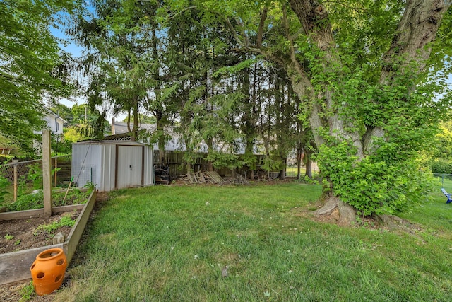 34 Fleming Ct, Groton, CT 06340 - fenced backyard with a shed and a vegetable garden