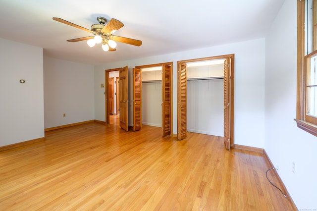 198 N Timber Ln, Cheshire, CT 06410 - unfurnished bedroom with multiple closets, light wood-type flooring, and a ceiling fan
