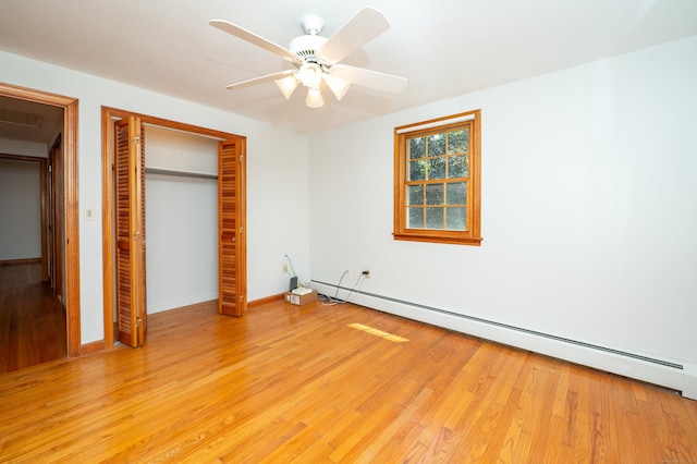 198 N Timber Ln, Cheshire, CT 06410 - unfurnished bedroom with a baseboard radiator, a closet, light wood-style floors, and a ceiling fan