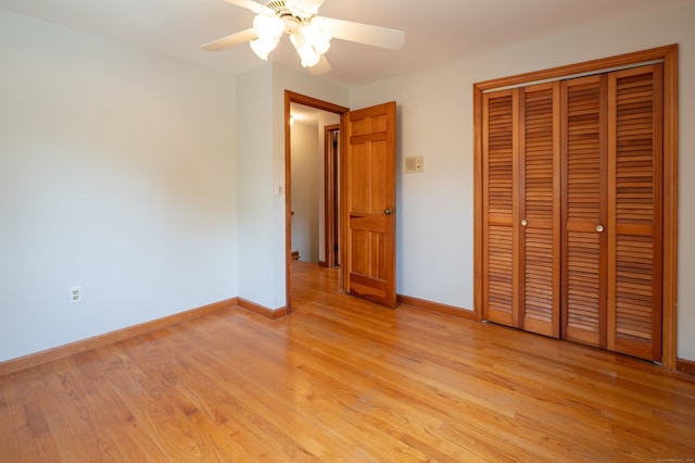 198 N Timber Ln, Cheshire, CT 06410 - unfurnished bedroom with light wood-type flooring, a closet, and a ceiling fan
