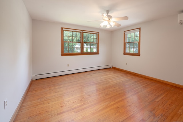 198 N Timber Ln, Cheshire, CT 06410 - spare room featuring a baseboard heating unit, light wood-type flooring, and a ceiling fan