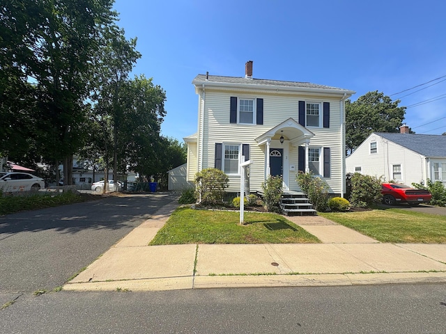 3 Mountain View Ave, Enfield, CT 06082 - view of front of property with a chimney and a front yard