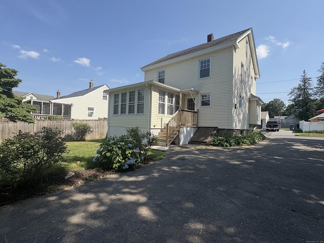 3 Mountain View Ave, Enfield, CT 06082 - back of house with a chimney and asphalt driveway