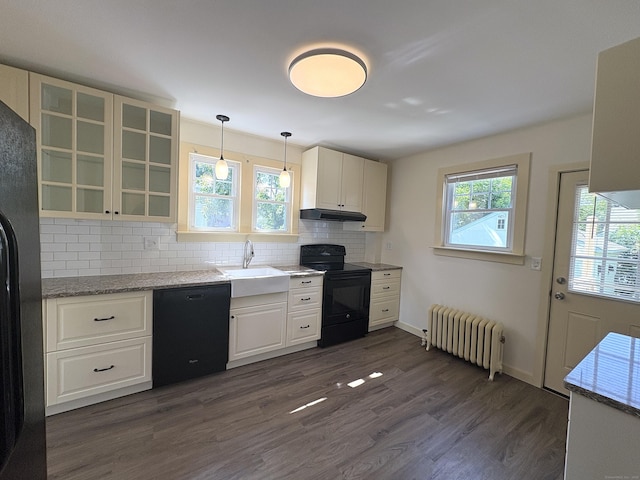 3 Mountain View Ave, Enfield, CT 06082 - kitchen featuring radiator, black appliances, plenty of natural light, and tasteful backsplash