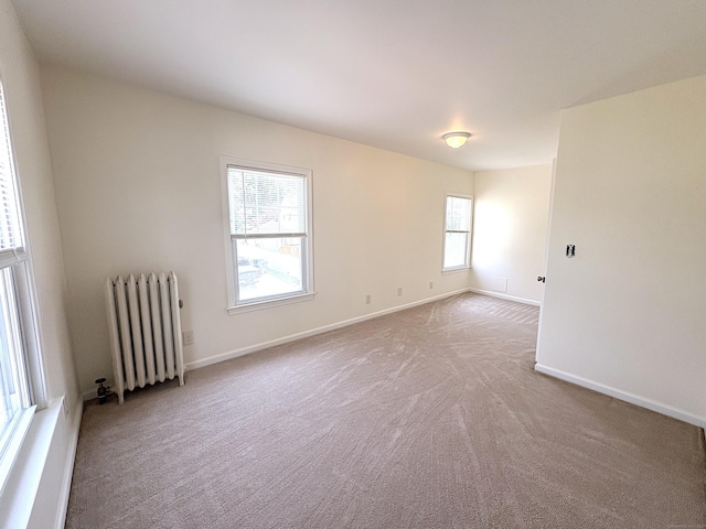 3 Mountain View Ave, Enfield, CT 06082 - carpeted spare room with radiator and baseboards