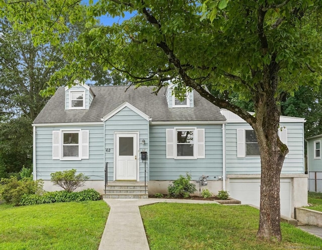 62 Severance Dr, Stamford, CT 06905 - cape cod house with a front lawn and a shingled roof