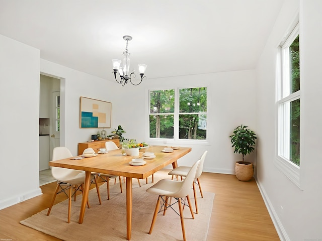 62 Severance Dr, Stamford, CT 06905 - dining area with a chandelier and light wood finished floors