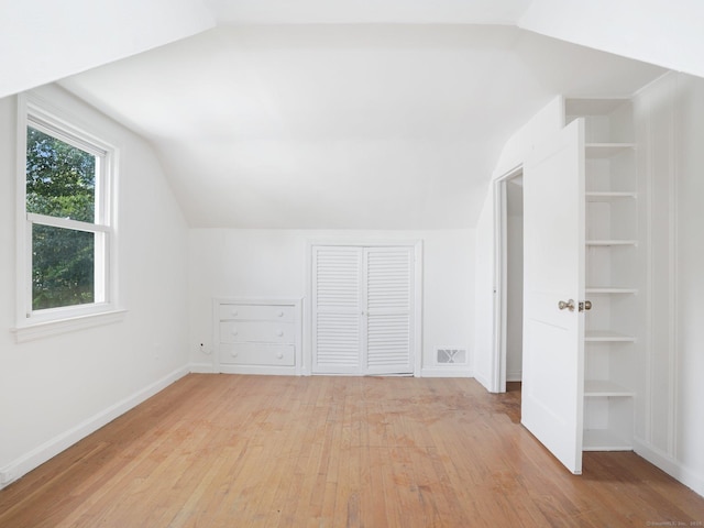 62 Severance Dr, Stamford, CT 06905 - additional living space with vaulted ceiling and light wood finished floors