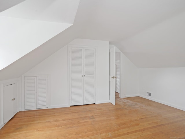 62 Severance Dr, Stamford, CT 06905 - additional living space with light wood finished floors and vaulted ceiling