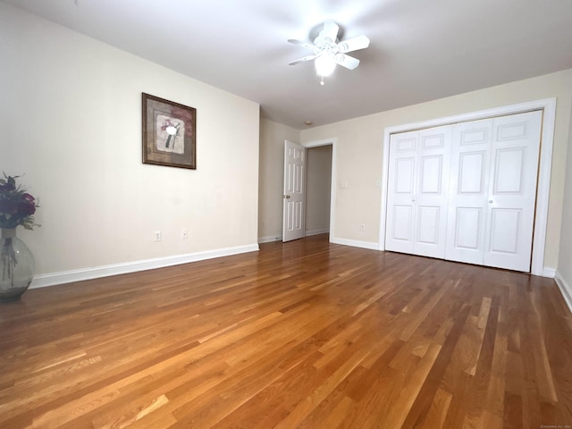 41 Calloway Dr, Milford, CT 06461 - unfurnished bedroom featuring wood finished floors, ceiling fan, and a closet