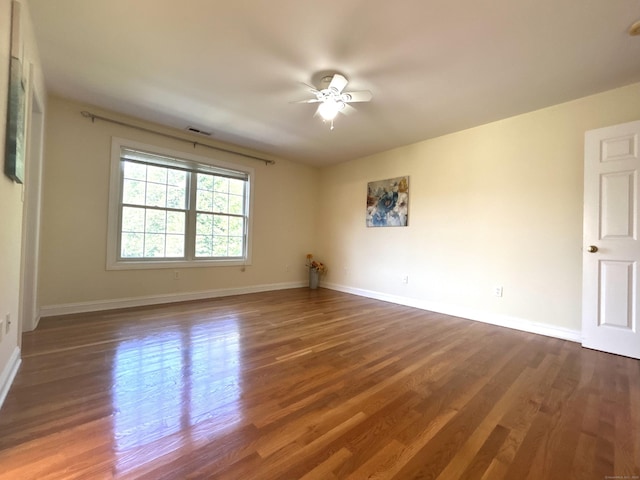 41 Calloway Dr, Milford, CT 06461 - spare room featuring wood finished floors and a ceiling fan