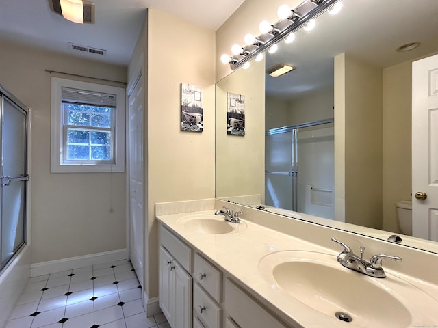 41 Calloway Dr, Milford, CT 06461 - bathroom with double vanity and tile patterned flooring