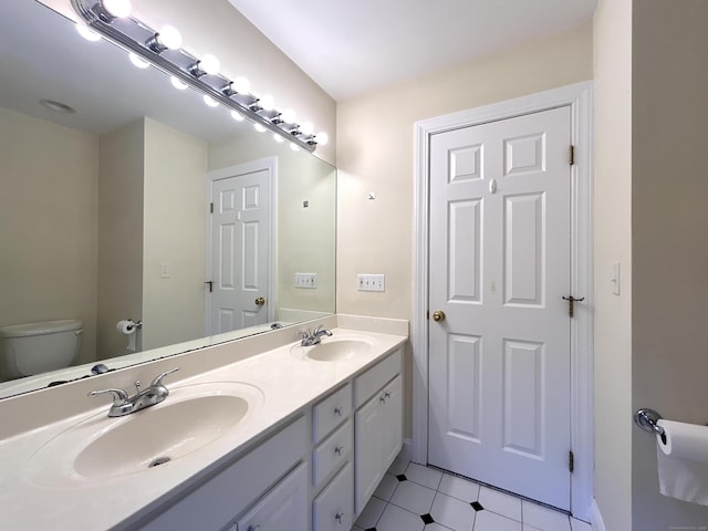 41 Calloway Dr, Milford, CT 06461 - full bathroom with double vanity and tile patterned floors