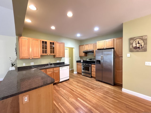 41 Calloway Dr, Milford, CT 06461 - kitchen featuring stainless steel appliances, under cabinet range hood, recessed lighting, glass insert cabinets, and light wood-style flooring