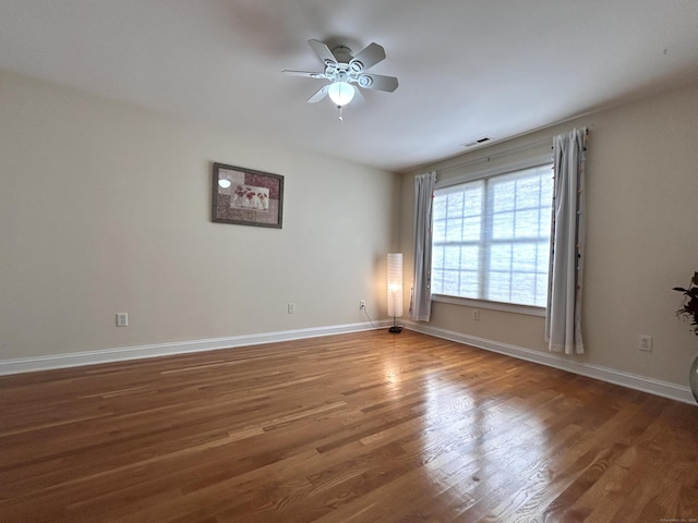 41 Calloway Dr, Milford, CT 06461 - spare room featuring ceiling fan and wood finished floors