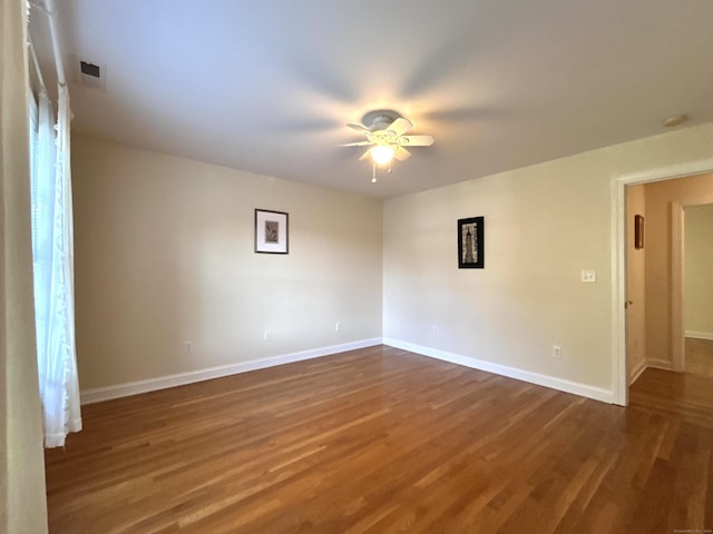 41 Calloway Dr, Milford, CT 06461 - unfurnished room featuring ceiling fan and dark wood-type flooring