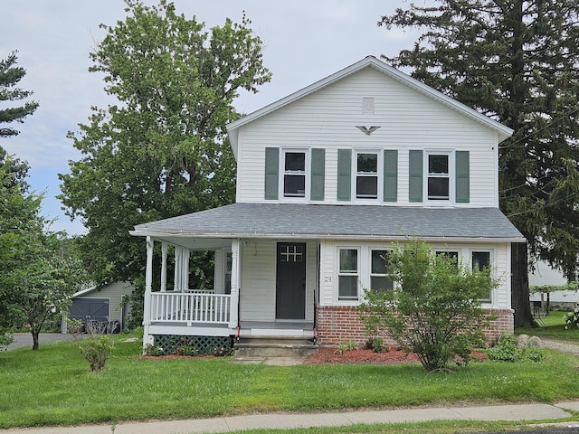 24 Lake Ave, Danbury, CT 06810 - view of front of house with covered porch, a front lawn, a shingled roof, and brick siding