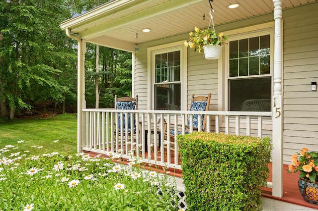 15 Tisbury Rd, Old Lyme, CT 06371 - property entrance with a porch and a lawn