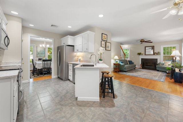 15 Tisbury Rd, Old Lyme, CT 06371 - kitchen with ceiling fan, appliances with stainless steel finishes, light countertops, healthy amount of natural light, and recessed lighting