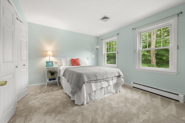 15 Tisbury Rd, Old Lyme, CT 06371 - bedroom featuring baseboard heating and carpet