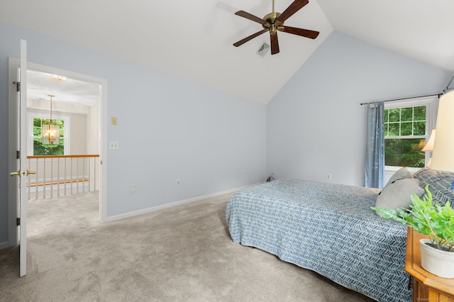 15 Tisbury Rd, Old Lyme, CT 06371 - carpeted bedroom featuring multiple windows, a chandelier, ceiling fan, and high vaulted ceiling