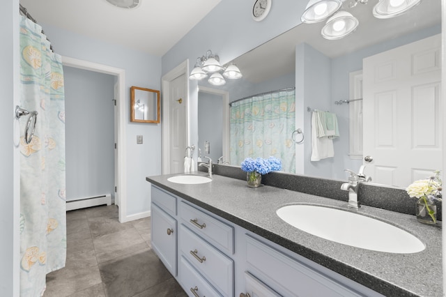 15 Tisbury Rd, Old Lyme, CT 06371 - bathroom with baseboard heating and double vanity