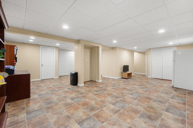 15 Tisbury Rd, Old Lyme, CT 06371 - finished below grade area featuring freestanding refrigerator and a paneled ceiling