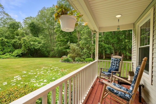 15 Tisbury Rd, Old Lyme, CT 06371 - wooden porch featuring a yard