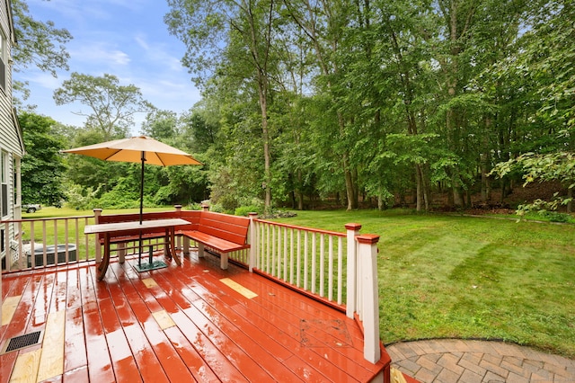15 Tisbury Rd, Old Lyme, CT 06371 - wooden deck with a lawn and view of wooded area