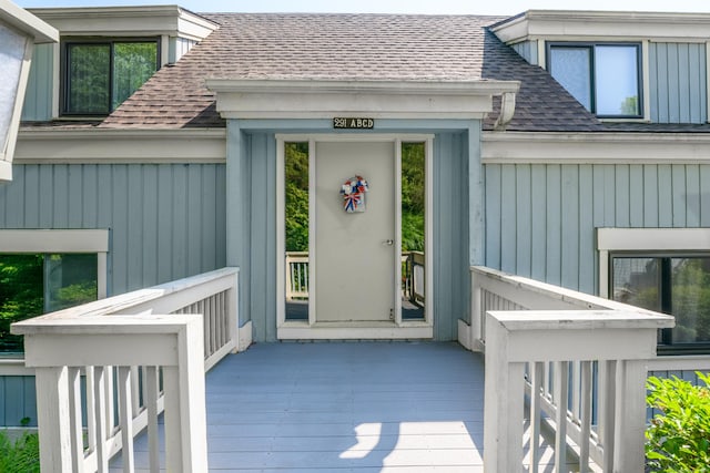 291 Heritage Vlg Unit C, Southbury, CT 06488 - entrance to property featuring a shingled roof and a deck