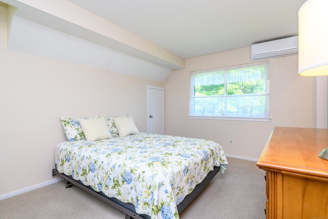 291 Heritage Vlg Unit C, Southbury, CT 06488 - carpeted bedroom featuring a wall mounted air conditioner and baseboards