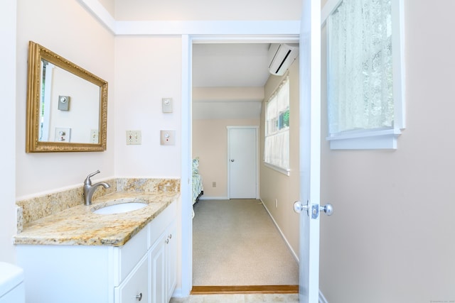 291 Heritage Vlg Unit C, Southbury, CT 06488 - bathroom featuring a wall mounted AC and vanity