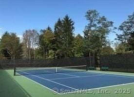291 Heritage Vlg Unit C, Southbury, CT 06488 - view of tennis court with community basketball court