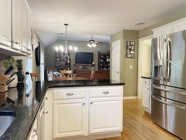 1040 Purchase Brook Rd, Southbury, CT 06488 - kitchen featuring stainless steel refrigerator with ice dispenser, a peninsula, a ceiling fan, white cabinetry, and lofted ceiling